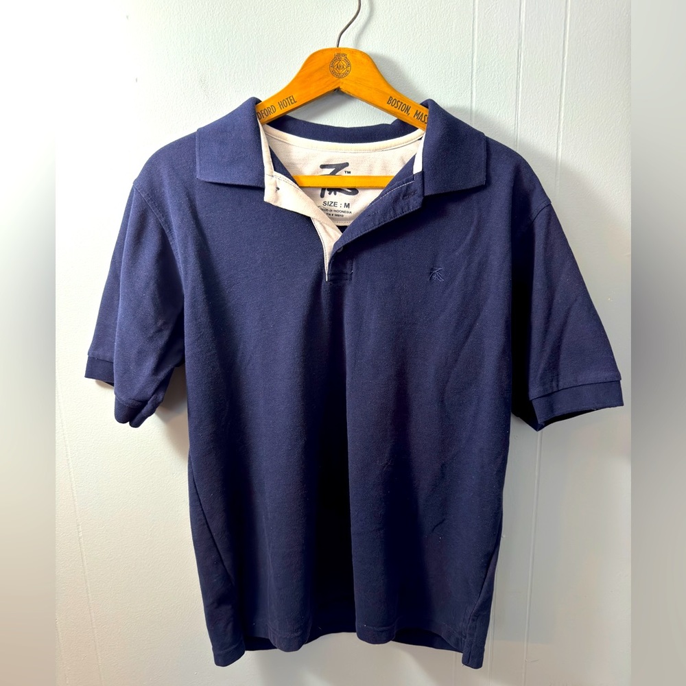 Polo Shirt, Size Medium. Unsure of the name of this brand.